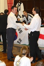 Master Mark Willoughby Receiving his 3rd Dan Black Belt from Master Pat Cloherty